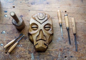 Woodworker Carves Skyrim Dragon Priest Masks Out of Reclaimed Pieces of Walnut