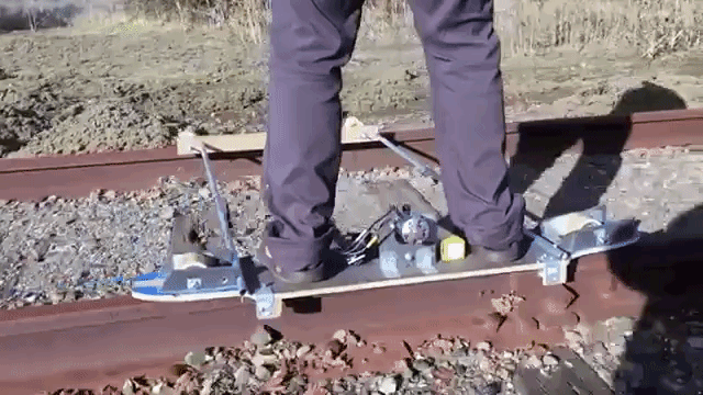 A Man Builds an Electric Skateboard and Rides It on Abandoned Railroad Tracks