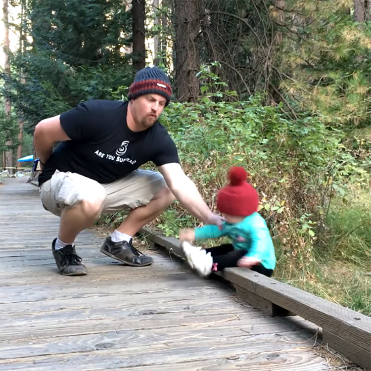 Dad Catches His Daughter With One Hand Just as She Begins to Fall Off of a Bridge