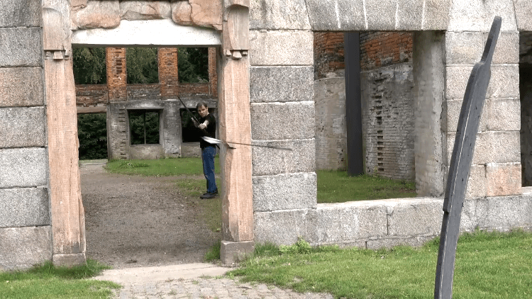 Danish Archer Lars Andersen Fires 'Turning Arrows' Around People And Obstacles