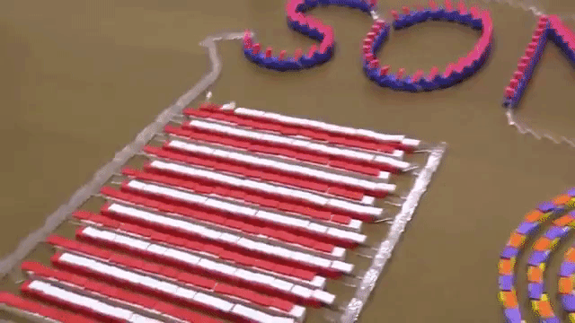 Hypnotizing 'Soniverse' Domino Run Appears to Fall Over Forward and Backwards All At Once