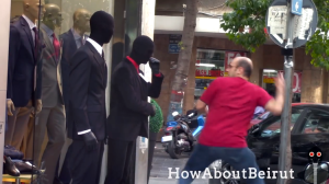 Two Guys Dressed as Mannequins Surprise People Who Walk by Them on the Sidewalk