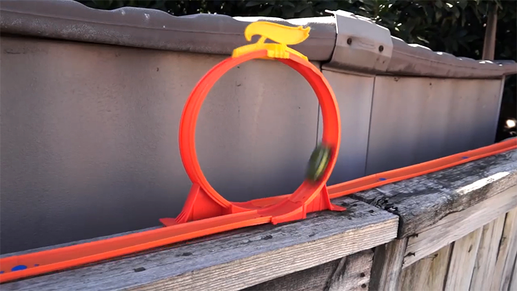A Hot Wheels and a 3D Printed Camera Car Speed Through an Incredible Backyard Race Track