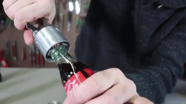 A Metal Mechanical Bottle Opener That Works by Firmly Squeezing Its Two Handles Together