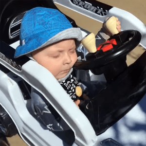 Adorable Infant Falls Asleep at the Wheel While Driving His Electric Toy Car