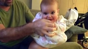 Funny Father Makes His Happy Baby Daughter Do an Impression of BB-8 from Star Wars