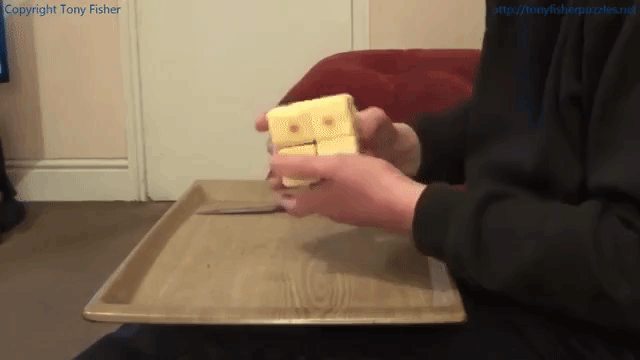 A Functioning 2x2 Rubik's Cube Made Out of Cheddar Cheese