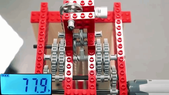 A LEGO Motor and Pulley Rig Lifts 220 Pounds