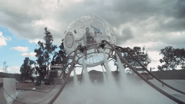 Flying Around in a Giant Inflatable Ball Equipped With Powerful Water Jets in Slow Motion