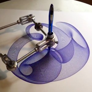 Mesmerizing Timelapse of Spiral Drawings Being Made by a Mechanical Drawing Machine