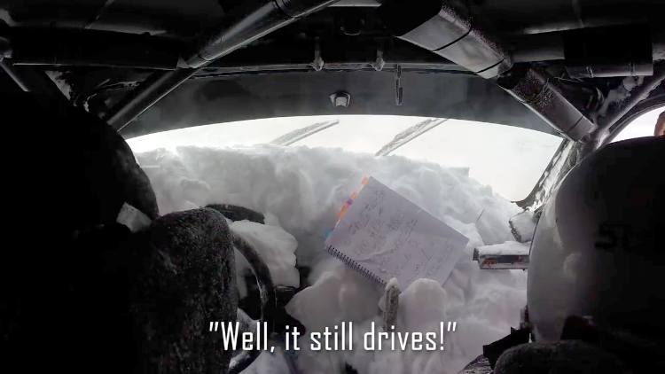 rally-car-rolls-into-a-snowbank.png