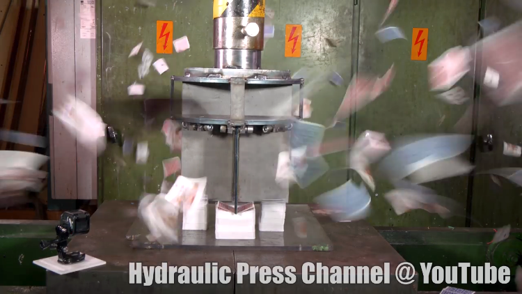 A Hydraulic Press Cuts Through 20 Decks of Playing Cards With Four Giant Blades