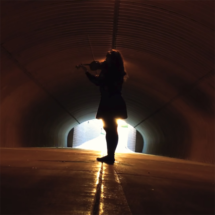 Violinist Performs a Beautiful Cover of 'The Force Theme' From Star Wars in a Tunnel