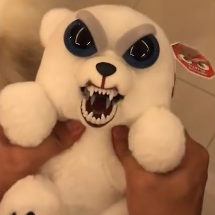 stuffed bear with teeth
