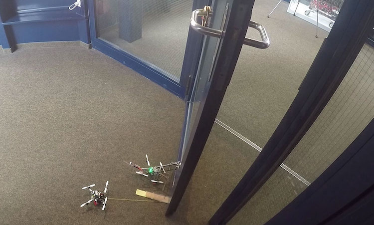 Drones-Work-Together-to-Open-Door.jpeg