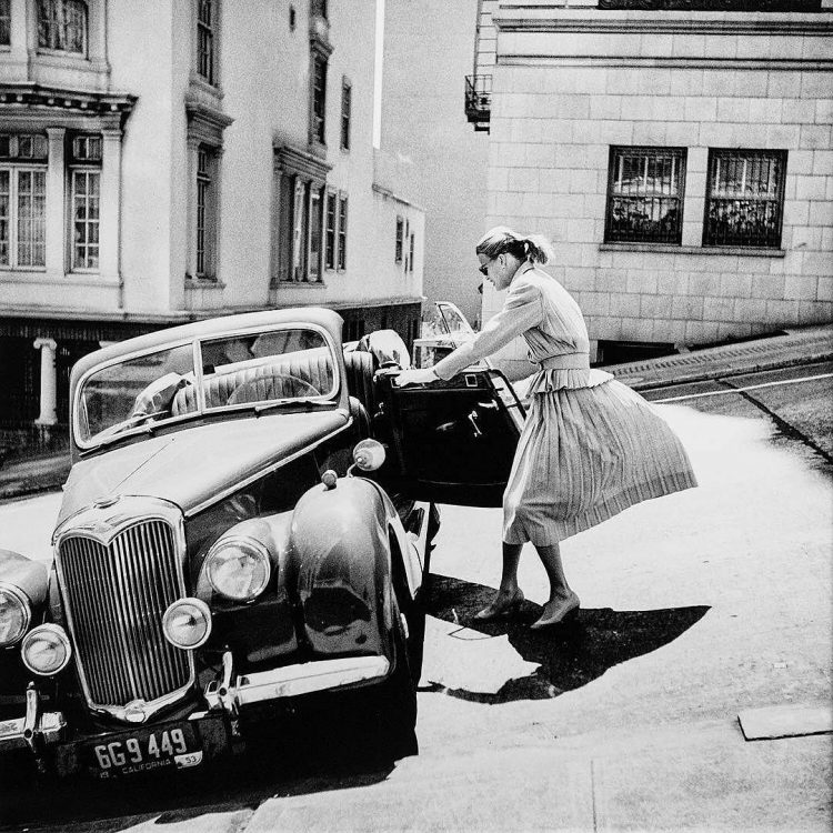 Anne Lyon getting into her Riley on a windy day in Nob Hill, 1950s’