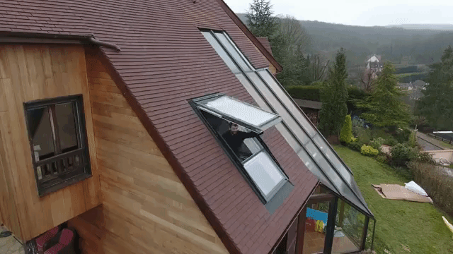 Roof Window That Turns Into a Balcony