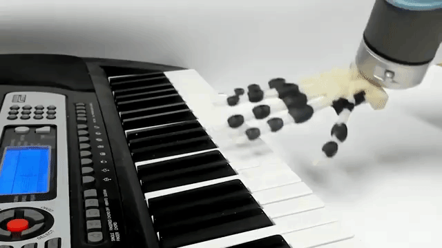 Robotic 3D Printed Hand Plays Piano