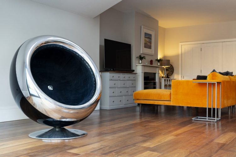 An Ultra Modern Enclosed Chair Made Out of a Jet Engine Cowling From a