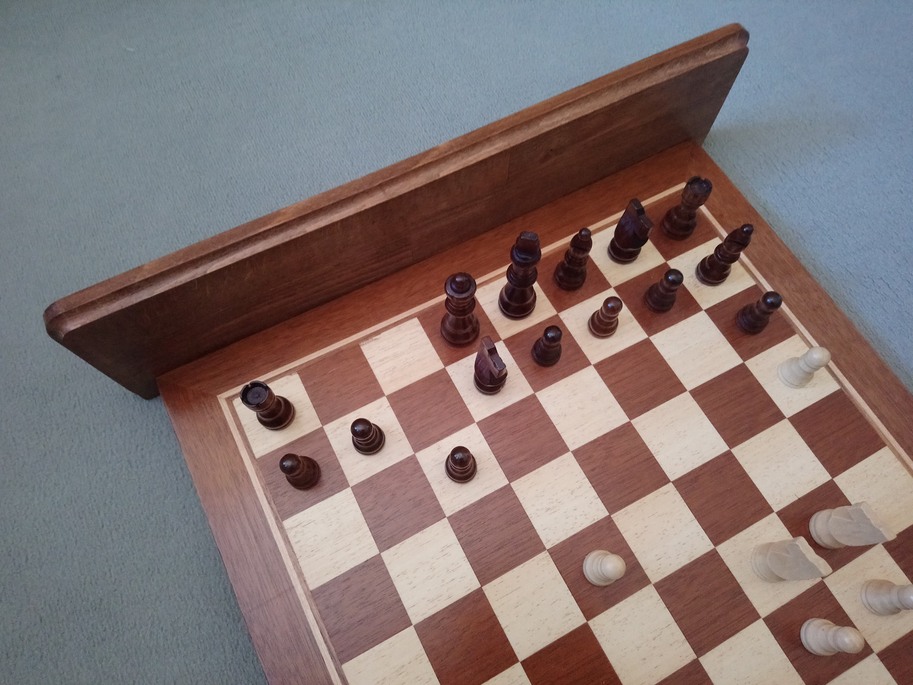 A Beautiful Coat Rack Made From an Upcycled Chess Board Positioned in ...