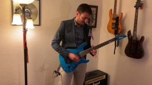Newly Naturalized American Citizen Celebrates With New Guitar