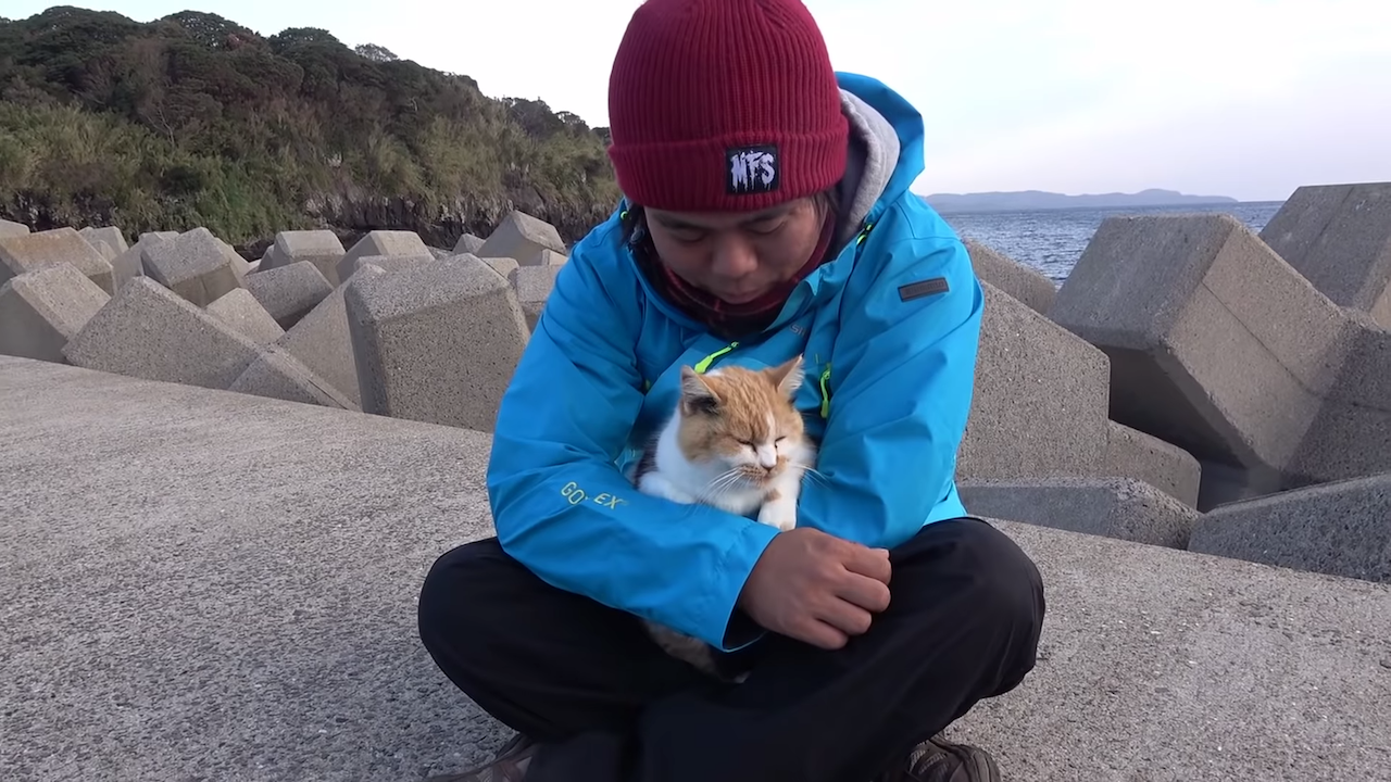 Fisherman-and-Calico-Cat-at-Cement-Docks