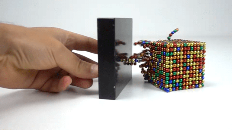 Mesmerizing Footage of the Powerful Attraction Between Super Strong Magnets and Magnetic Balls