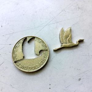 Micah Adams Coin Cutting Art