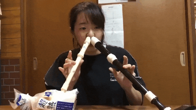 Girl Plays Two Recorders Using Her Nose
