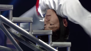 Acrobatic Man Breaks Own Record Climbing Stairs With Head