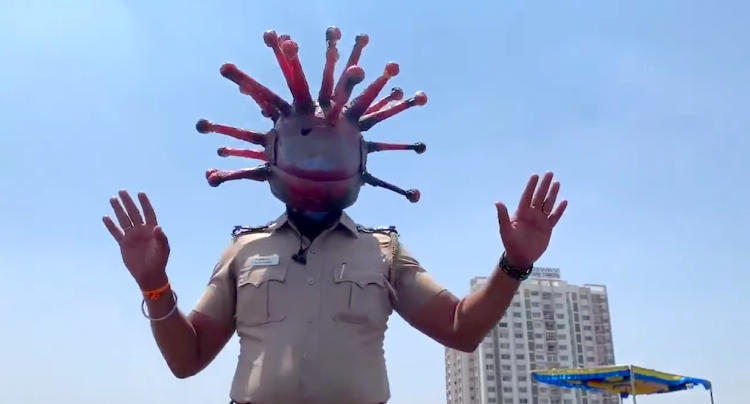 Police Inspector in India Wears Coronavirus Helmet