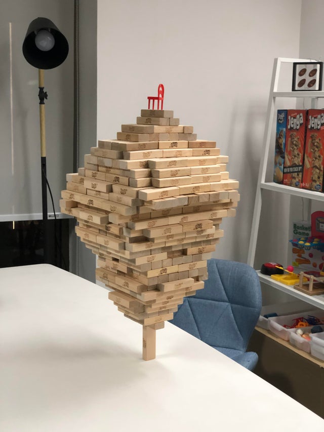 Man Remarkably Stacks 518 Jenga Blocks Onto One Vertical Jenga Block Breaking World Record