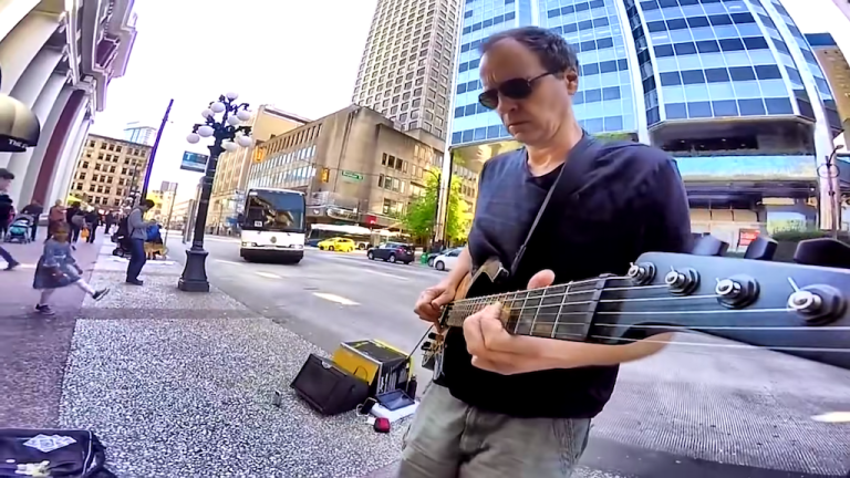 Little Girl Dances to Street Musician ZZ Top