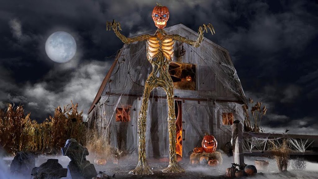 Posable 12 Ft Pumpkin Skeleton With LED Eyes