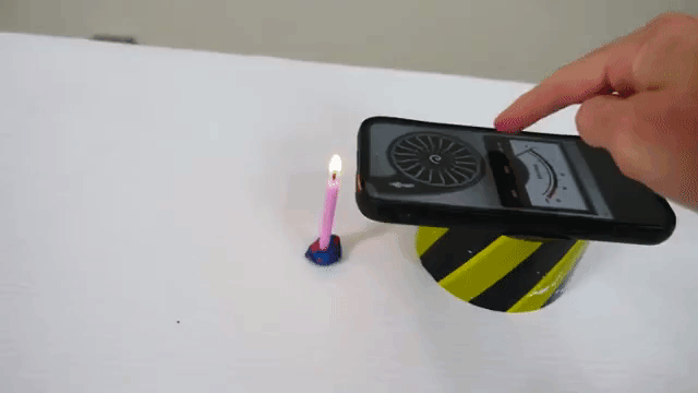 App Blowing Out Candle