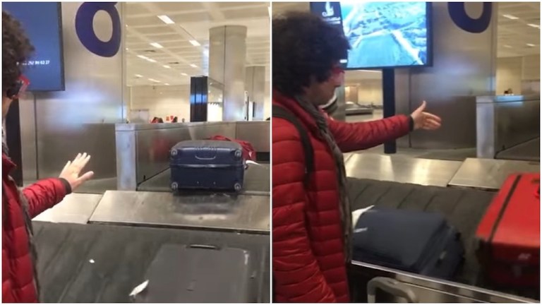 Man Directs Luggage Traffic at Barcelona Airport