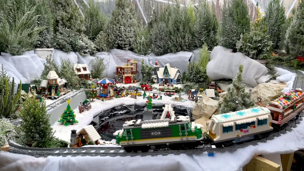 Man Builds Snowy Backyard Forest for a Giant LEGO Train to Deliver Holiday Presents to His Cats