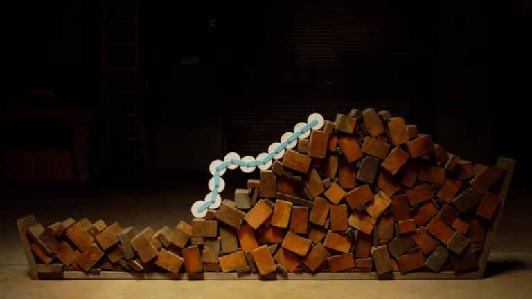 Robotic Caterpillar Climbs Woodpile