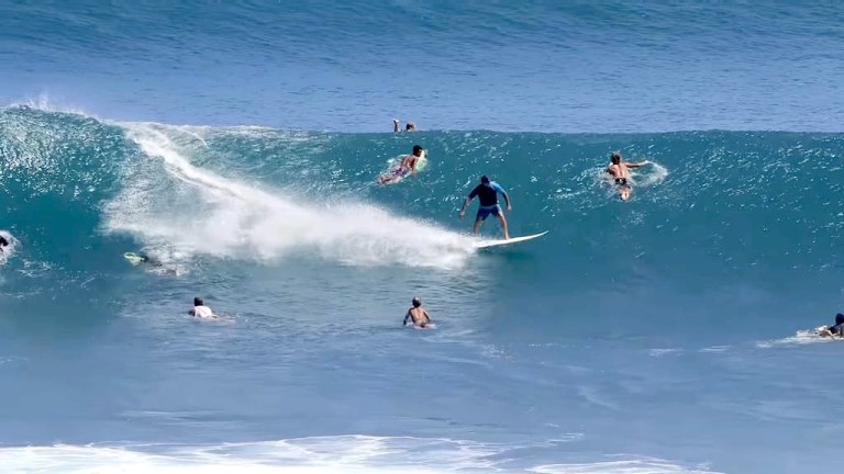 Surfer Avoids Hitting 25 Surfers