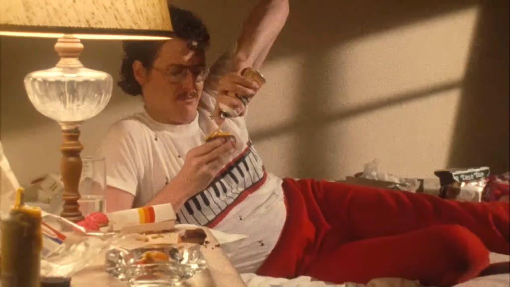 ‘Weird Al’ Yankovic Plays With His Food During a Coverage Take for the ‘Eat It’ Video
