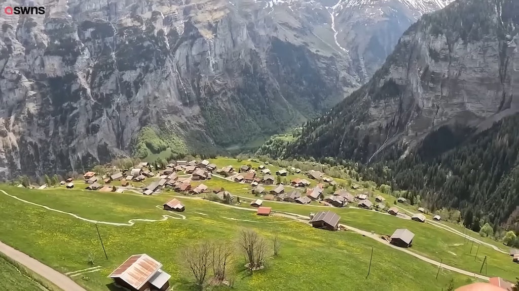 First time paraglider captures STUNNING footage of historic Swiss village
