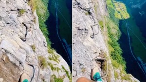 Man Climbs Near Vertical Cliffside Path Swiss Alps