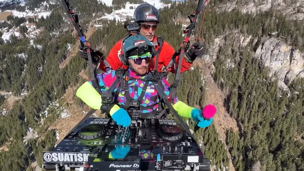 DJ Spins Tunes While Paragliding Over Austrian Alps