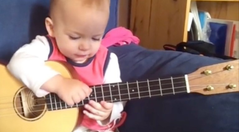 Baby Plays Guitar Like Rock Star