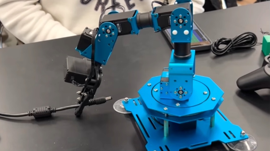 Robot Unplugs Itself