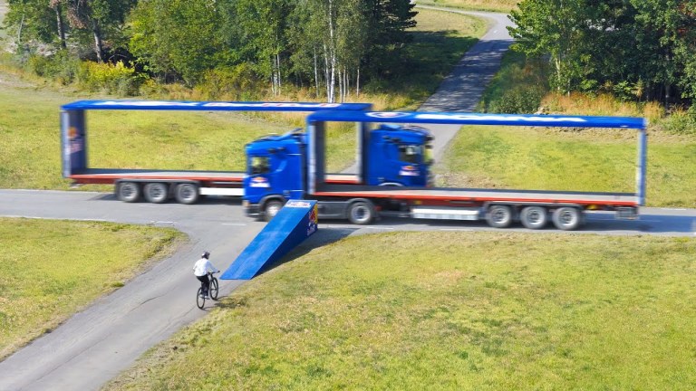 Jumping Through Two Trucks