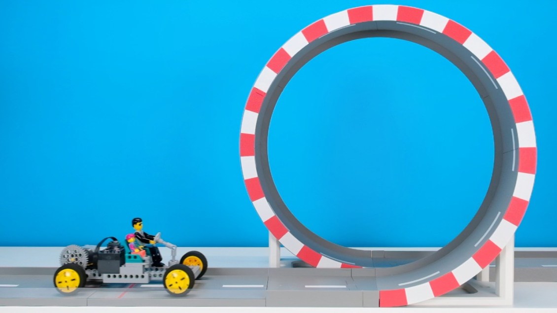 Engineer Builds Increasingly Complex LEGO Cars to Safely Drive Through Increasingly Larger Loops