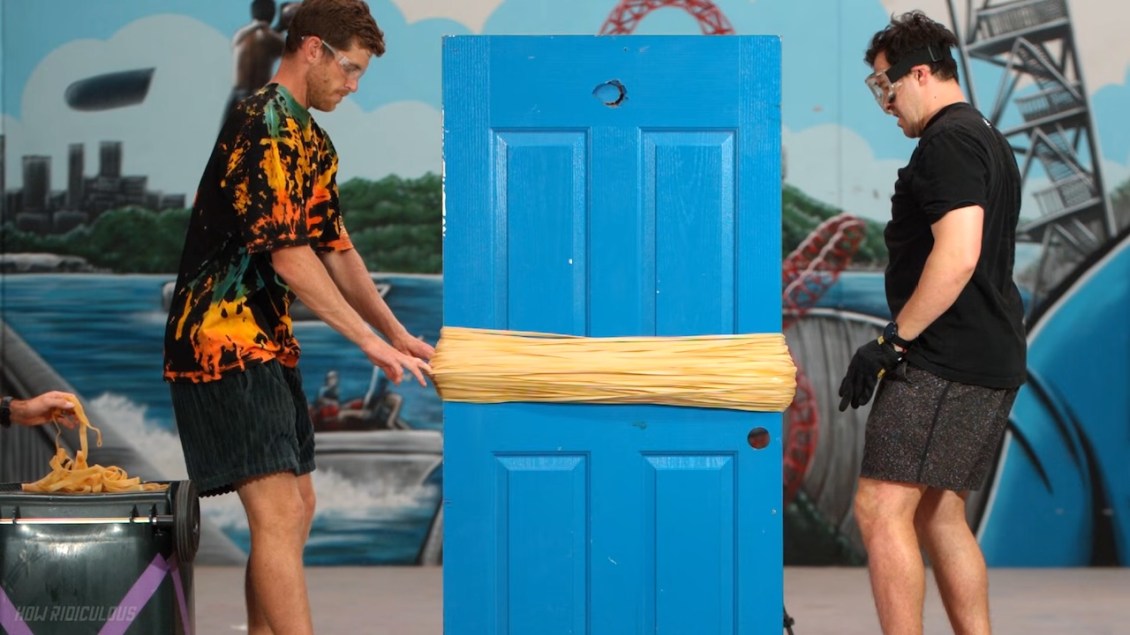 Slow Motion Footage of Random Objects Succumbing to the Immense Pressure of Rubber Bands