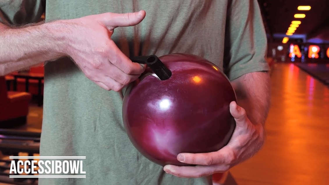 A Clever Adaptive Bowling Ball With Spring-Loaded Handle For People With Limited Upper Body Mobility