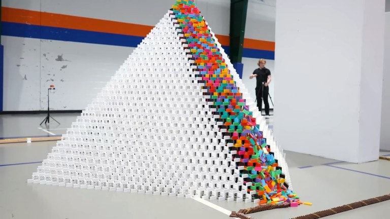 Most Dominoes Toppled 3D Pyramid
